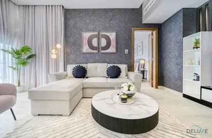 Living Room image for: Apartment - 1 Bedroom - 1 Bathroom for rent in Azizi Aliyah - Dubai Healthcare City - Dubai, Image 1