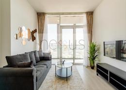 Living Room image for: Apartment - 1 bedroom - 1 bathroom for rent in Bloom Towers B - Bloom Towers - Jumeirah Village Circle - Dubai, Image 1