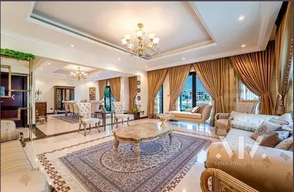 Living Room image for: Villa - 4 Bedrooms - 5 Bathrooms for rent in Frond C - Garden Homes - Palm Jebel Ali - Dubai, Image 1