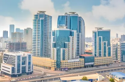 شقة - غرفة نوم - 2 حمامات للايجار في أورينت تاور 1 - أورينت تاور - البستان - عجمان