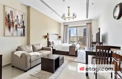 Living / Dining Room image for: Apartment - 1 Bathroom for sale in Elite Downtown Residence - Downtown Dubai - Dubai, Image 1