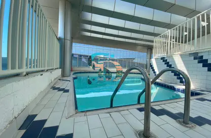 صورة لـ حوض سباحة شقة - 3 غرف نوم - 4 حمامات للايجار في خليفة بارك - الطريق الشرقي - أبوظبي ، صورة رقم 1