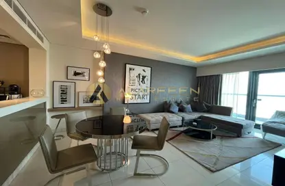 Living / Dining Room image for: Apartment - 2 Bedrooms - 3 Bathrooms for rent in Park Central - Business Bay - Dubai, Image 1