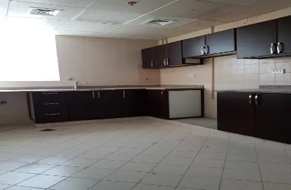 Kitchen image for: Apartment - 2 Bedrooms - 3 Bathrooms for rent in Shabia - Mussafah - Abu Dhabi, Image 1