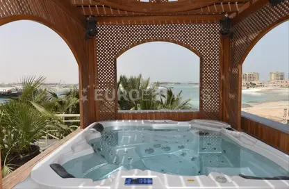 Pool image for: Villa - 5 Bedrooms for sale in Al Hamra Village Villas - Al Hamra Village - Ras Al Khaimah, Image 1