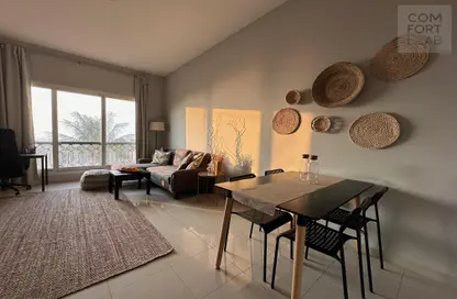 Living / Dining Room image for: Apartment - 1 Bedroom - 2 Bathrooms for rent in Kahraman - Bab Al Bahar - Al Marjan Island - Ras Al Khaimah, Image 1