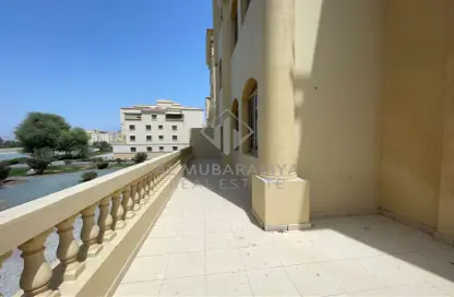Terrace image for: Apartment - 2 Bedrooms - 3 Bathrooms for sale in Building 2 - Yasmin Village - Ras Al Khaimah, Image 1