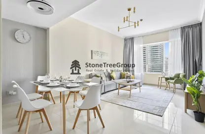 Living / Dining Room image for: Apartment - 1 Bedroom - 1 Bathroom for rent in V3 Tower - Lake Allure - Jumeirah Lake Towers - Dubai, Image 1