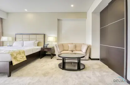Room / Bedroom image for: Apartment - 1 Bathroom for rent in The Address Dubai Marina - Dubai Marina - Dubai, Image 1