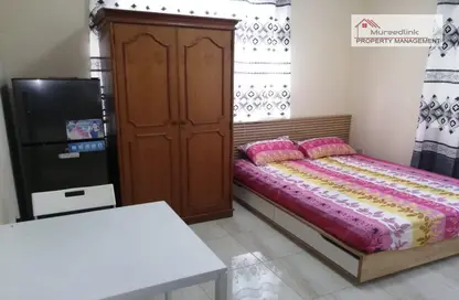 Room / Bedroom image for: Apartment - 1 Bathroom for rent in Al Zahraa - Abu Dhabi, Image 1