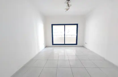 Empty Room image for: Apartment - 2 Bedrooms - 2 Bathrooms for rent in Lily Tower - Al Nahda - Sharjah, Image 1