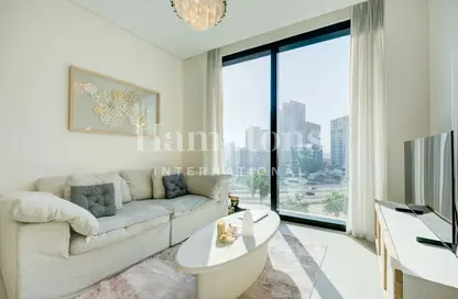 Living Room image for: Apartment - 1 Bedroom - 1 Bathroom for sale in Jumeirah Gate Tower 1 - The Address Jumeirah Resort and Spa - Jumeirah Beach Residence - Dubai, Image 1