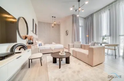 Living Room image for: Apartment - 1 Bathroom for rent in Mesk - Midtown - Dubai Production City (IMPZ) - Dubai, Image 1
