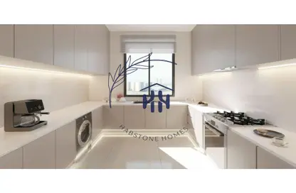 صورة لـ مطبخ شقة - 2 غرف نوم - 3 حمامات للبيع في جبل علي داون تاون - دبي ، صورة رقم 1