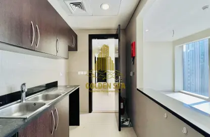 Kitchen image for: Apartment - 2 Bedrooms - 3 Bathrooms for rent in Khalidiya Twin Towers - Al Khalidiya - Abu Dhabi, Image 1