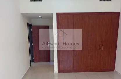 شقة - غرفة نوم - 2 حمامات للايجار في أوليمبك بارك 3 - أبراج اولمبيك بارك - مدينة دبي الرياضية - دبي