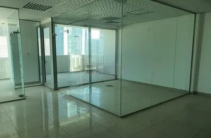 Empty Room image for: Office Space - Studio - 1 Bathroom for rent in The Prism - Business Bay - Dubai, Image 1