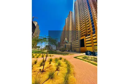 Outdoor Building image for: Apartment - 1 Bedroom - 1 Bathroom for rent in Paradise Lakes Tower B9 - Paradise Lakes Towers - Emirates City - Ajman, Image 1