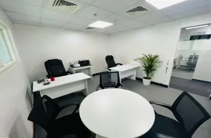 Office image for: Business Centre - Studio - 4 Bathrooms for rent in Al Rostamani Building - Port Saeed - Deira - Dubai, Image 1