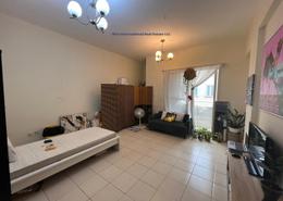 Living Room image for: Apartment - 1 bedroom - 2 bathrooms for rent in X17 - England Cluster - International City - Dubai, Image 1