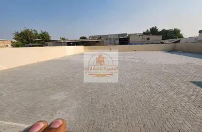 أرض - استوديو للايجار في المنطقة الصناعية 11 - المنطقة الصناعية بالشارقة - الشارقة