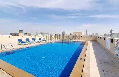 Apartment - 1 Bedroom - 1 Bathroom for rent in Burj Residence 2 - Jumeirah Village Circle - Dubai