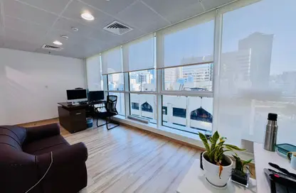 Office Space - Studio - 4 Bathrooms for rent in Hamdan Street - Abu Dhabi