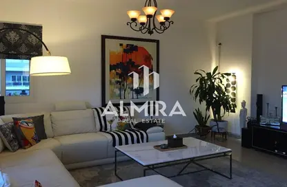 Living Room image for: Apartment - 3 Bedrooms - 4 Bathrooms for sale in Tower 18 - Al Reef Downtown - Al Reef - Abu Dhabi, Image 1