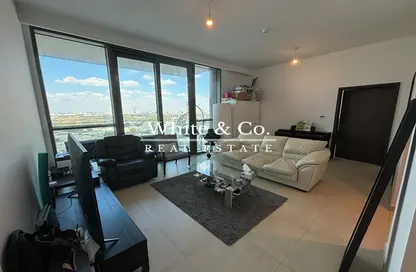 Living Room image for: Apartment - 1 Bedroom - 2 Bathrooms for rent in Downtown Views - Downtown Dubai - Dubai, Image 1