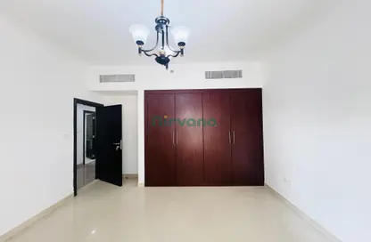 Room / Bedroom image for: Apartment - 2 Bedrooms - 2 Bathrooms for rent in Almeer Building - Barsha Heights (Tecom) - Dubai, Image 1