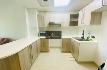 صورة لـ مطبخ شقة - 2 غرف نوم - 2 حمامات للايجار في جرين دايموند ١ بي - 1 غرين دايمند - ارجان - دبي ، صورة رقم 1
