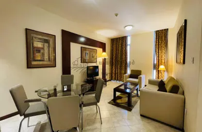 Living / Dining Room image for: Apartment - 1 Bedroom - 1 Bathroom for rent in Tourist Club Area - Abu Dhabi, Image 1