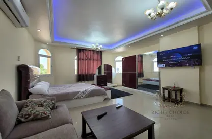 صورة لـ غرفة المعيشة شقة - 1 حمام للايجار في C2302 - مدينة خليفة أ - مدينة خليفة - أبوظبي ، صورة رقم 1