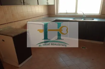 صورة لـ مطبخ شقة - 2 غرف نوم - 2 حمامات للايجار في مدينة الحميد - عجمان ، صورة رقم 1