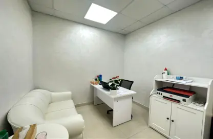 Living Room image for: Office Space - Studio - 6 Bathrooms for rent in Al Rostamani Building - Port Saeed - Deira - Dubai, Image 1