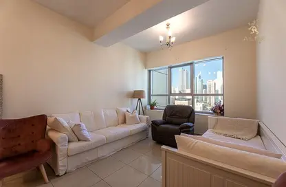Living Room image for: Apartment - 1 Bedroom - 2 Bathrooms for sale in Armada Tower 3 - Lake Elucio - Jumeirah Lake Towers - Dubai, Image 1