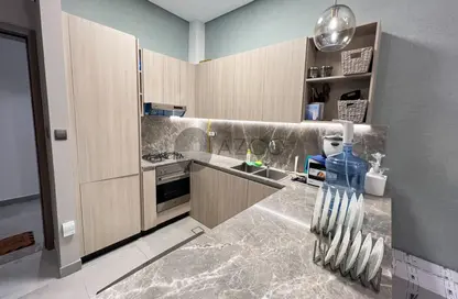 Kitchen image for: Apartment - 1 Bedroom - 2 Bathrooms for rent in La Riviera Azure - Jumeirah Village Circle - Dubai, Image 1