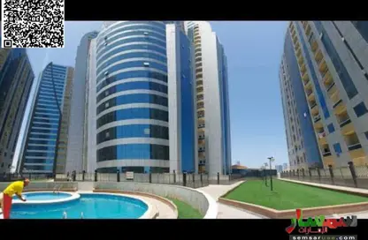 Apartment - 2 Bedrooms - 2 Bathrooms for sale in Orient Tower 1 - Orient Towers - Al Bustan - Ajman