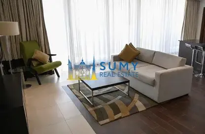 Living Room image for: Apartment - 1 Bedroom - 2 Bathrooms for sale in The Matrix - Dubai Sports City - Dubai, Image 1