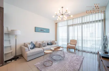Living Room image for: Apartment - 2 Bedrooms - 2 Bathrooms for sale in Beach Vista - EMAAR Beachfront - Dubai Harbour - Dubai, Image 1