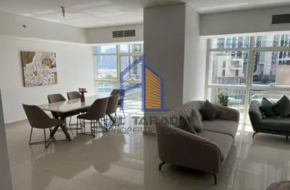 Living / Dining Room image for: Apartment - 2 Bedrooms - 3 Bathrooms for sale in Tala Tower - Marina Square - Al Reem Island - Abu Dhabi, Image 1