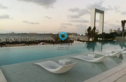 Pool image for: Apartment - 1 Bedroom - 1 Bathroom for rent in La Vie - Jumeirah Beach Residence - Dubai, Image 1