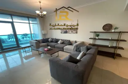 Living Room image for: Apartment - 2 Bedrooms - 3 Bathrooms for rent in Corniche Tower - Ajman Corniche Road - Ajman, Image 1