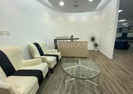 صورةغرفة المعيشة لـ: مكتب - 4 حمامات للكراء في مبنى 2 - ساحة إعمار - دبي وسط المدينة - دبي, صورة 1