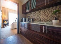 Kitchen image for: Studio - 1 bathroom for rent in Jannah Burj Al Sarab - Mina Road - Tourist Club Area - Abu Dhabi, Image 1