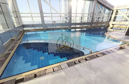 Pool image for: Apartment - 1 Bedroom - 2 Bathrooms for rent in Hamdan Street - Abu Dhabi, Image 1