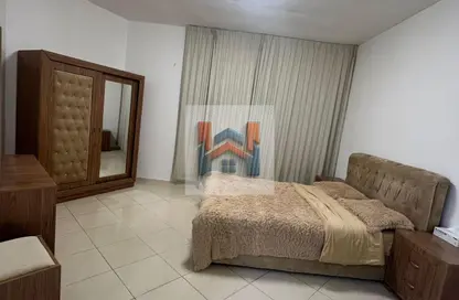 شقة - غرفة نوم - 2 حمامات للبيع في أورينت تاور 1 - أورينت تاور - البستان - عجمان