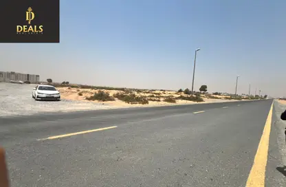 أرض - استوديو للبيع في روضة القرط - ضاحية الروضات - الشارقة