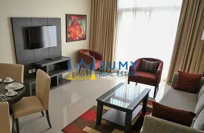 Living / Dining Room image for: Apartment - 1 Bedroom - 2 Bathrooms for rent in Siraj Tower - Arjan - Dubai, Image 1