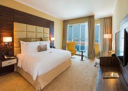 Hotel and Hotel Apartment - 1 bedroom - 1 bathroom for rent in Jannah Burj Al Sarab - Mina Road - Tourist Club Area - Abu Dhabi Room / Bedroom image for: Hotel and Hotel Apartment - 1 bedroom - 1 bathroom for rent in Jannah Burj Al Sarab - Mina Road - Tourist Club Area - Abu Dhabi, Image 1